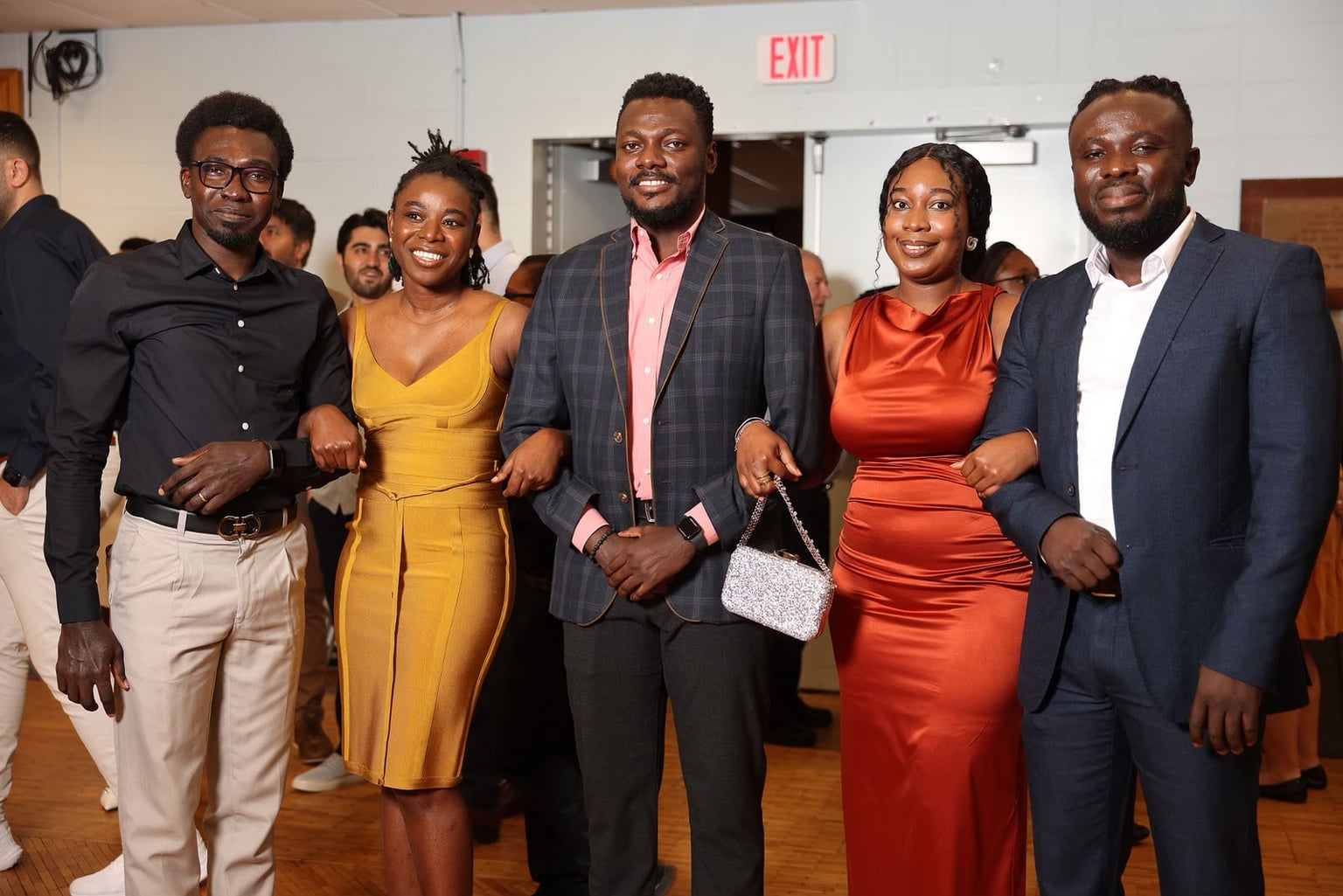 Terrick with colleagues at a formal event